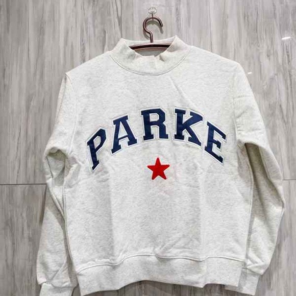 Parke Tops - PARKE White Sweatshirt with Blue and Red Accents